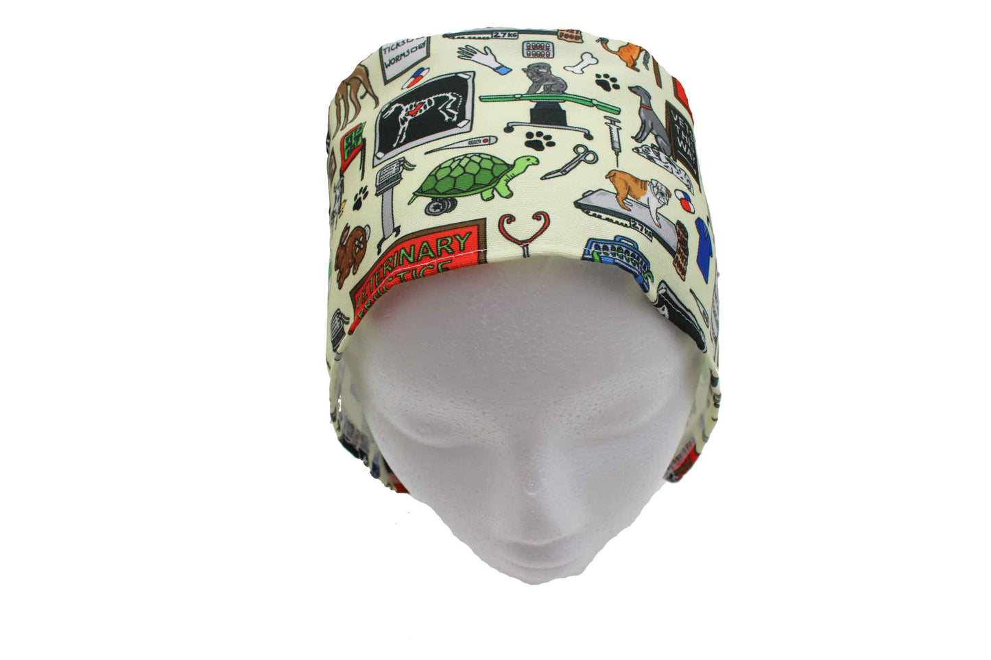 Medical scrub cap with veterinary-themed design on a white background