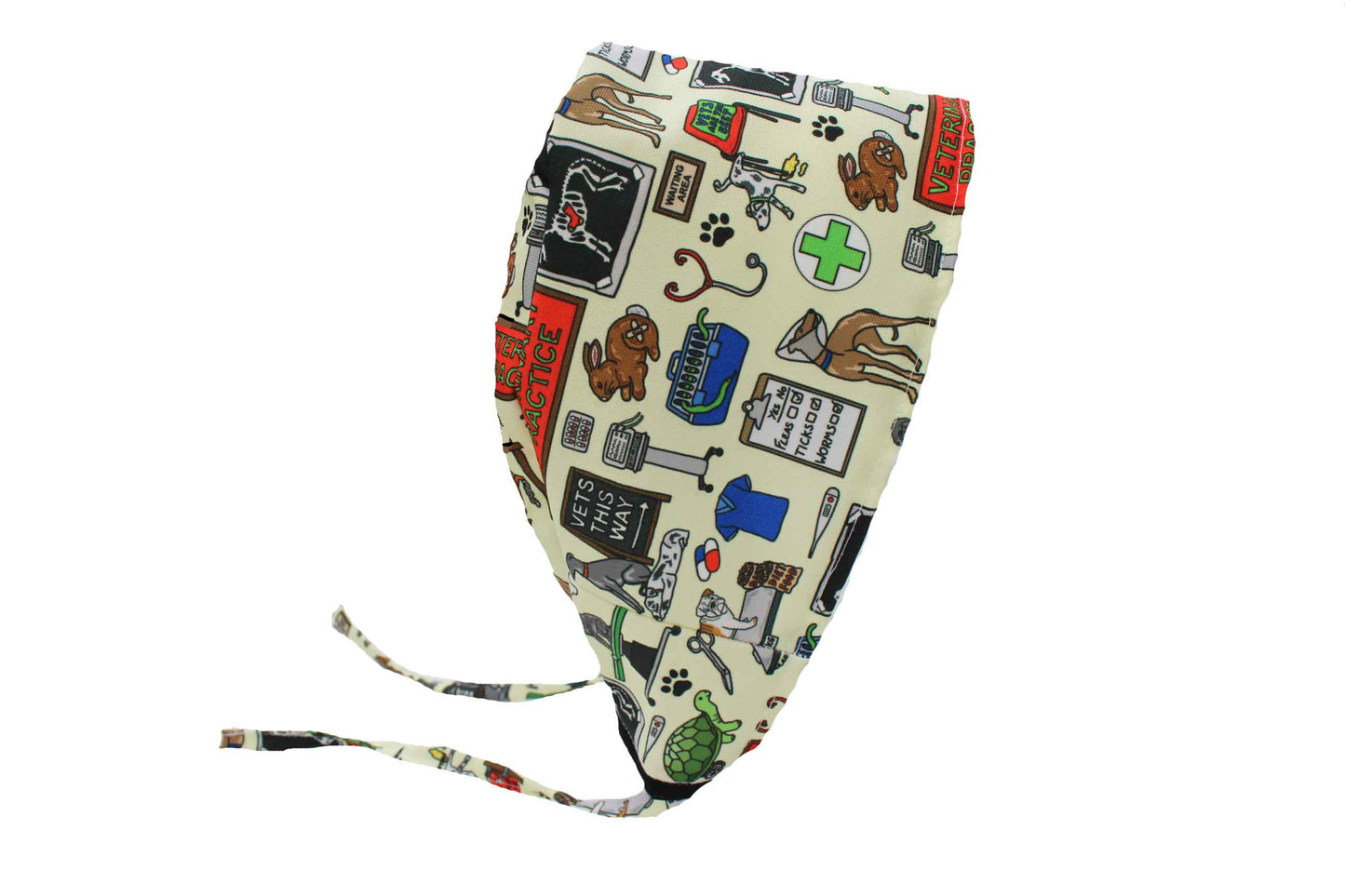 Medical scrub cap with veterinary-themed design on a white background