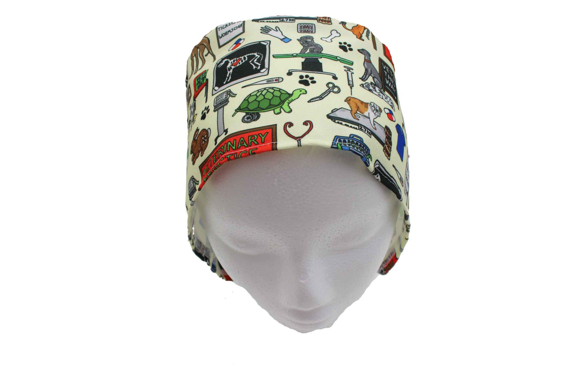 Medical scrub cap with veterinary-themed design on a white background