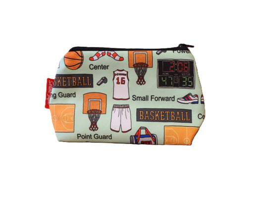 Basketball cosmetic bag with vibrant sport design featuring basketballs and hoops by Selina-Jayne