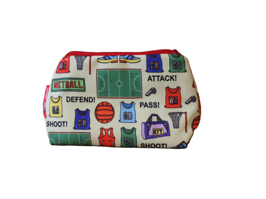 Netball cosmetic bag by Selina-Jayne featuring vibrant sports graphics, colour-coordinated zipper, and compact 17.5cm design
