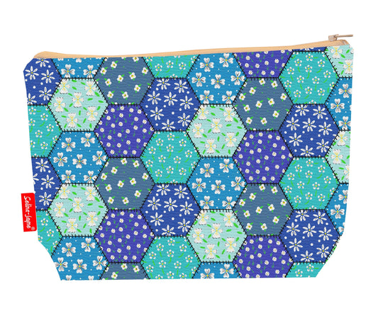 Patchwork toiletry bag with quilting design showing washable lining and zip closure