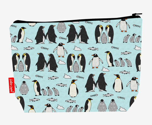 Penguins toiletry bag with Antarctic bird design showing washable lining and zip closure