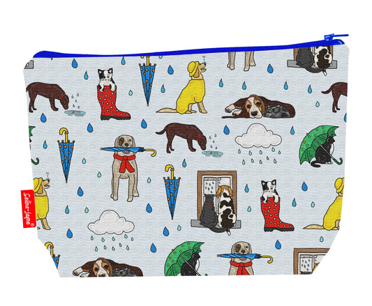 Raining cats and dogs toiletry bag showing playful British saying design with washable lining and coordinated zip